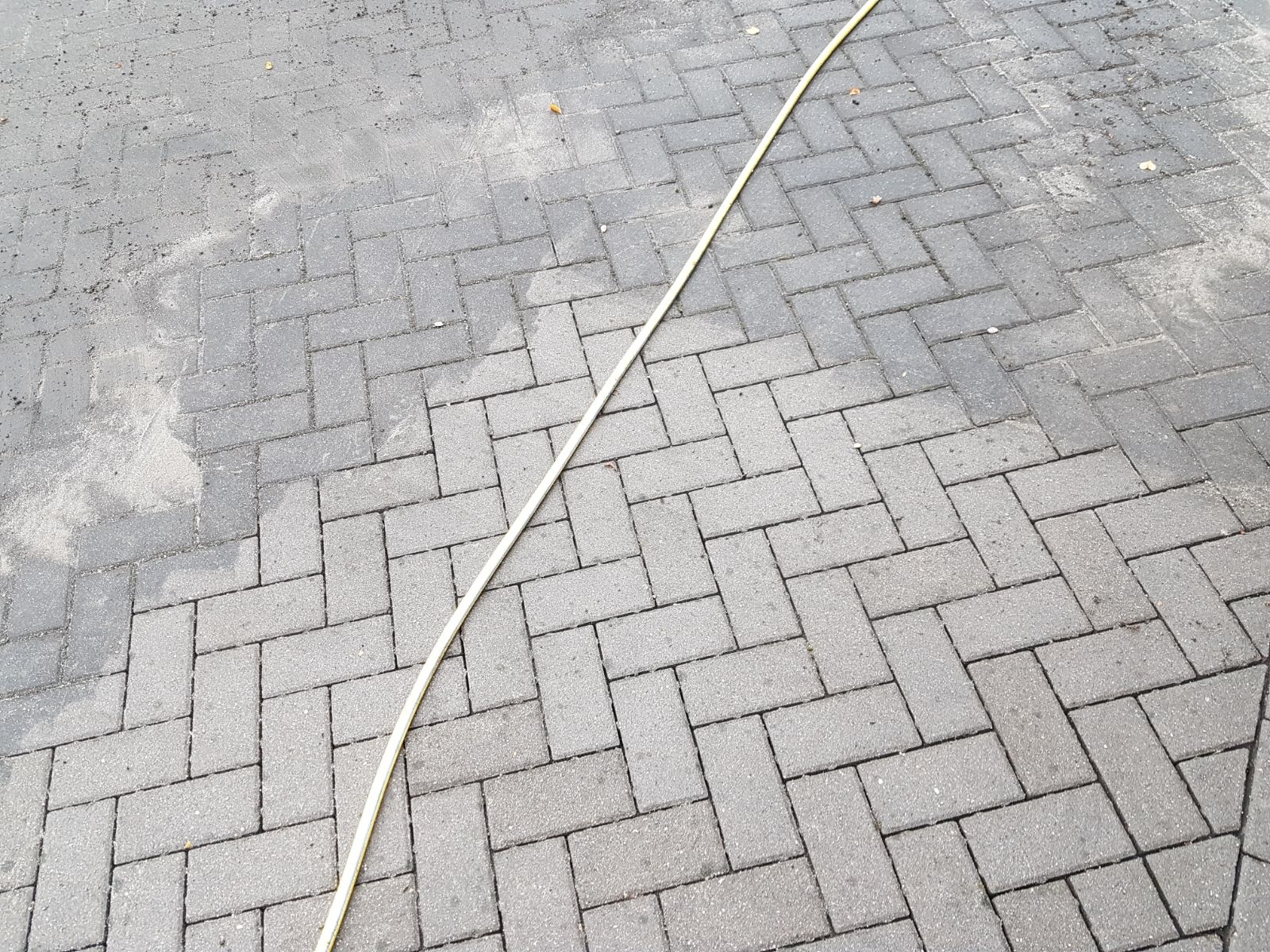 Stoepreiniging voor en na - Horst